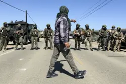 Protesters and federal agents clash during raid at Southern California farm