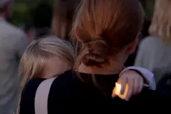 Minneapolis Catholic schoolchildren listened to a prayer, then ducked for cover from gunfire