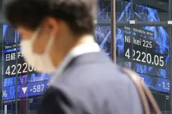 Wall Street holds steady just below recent records